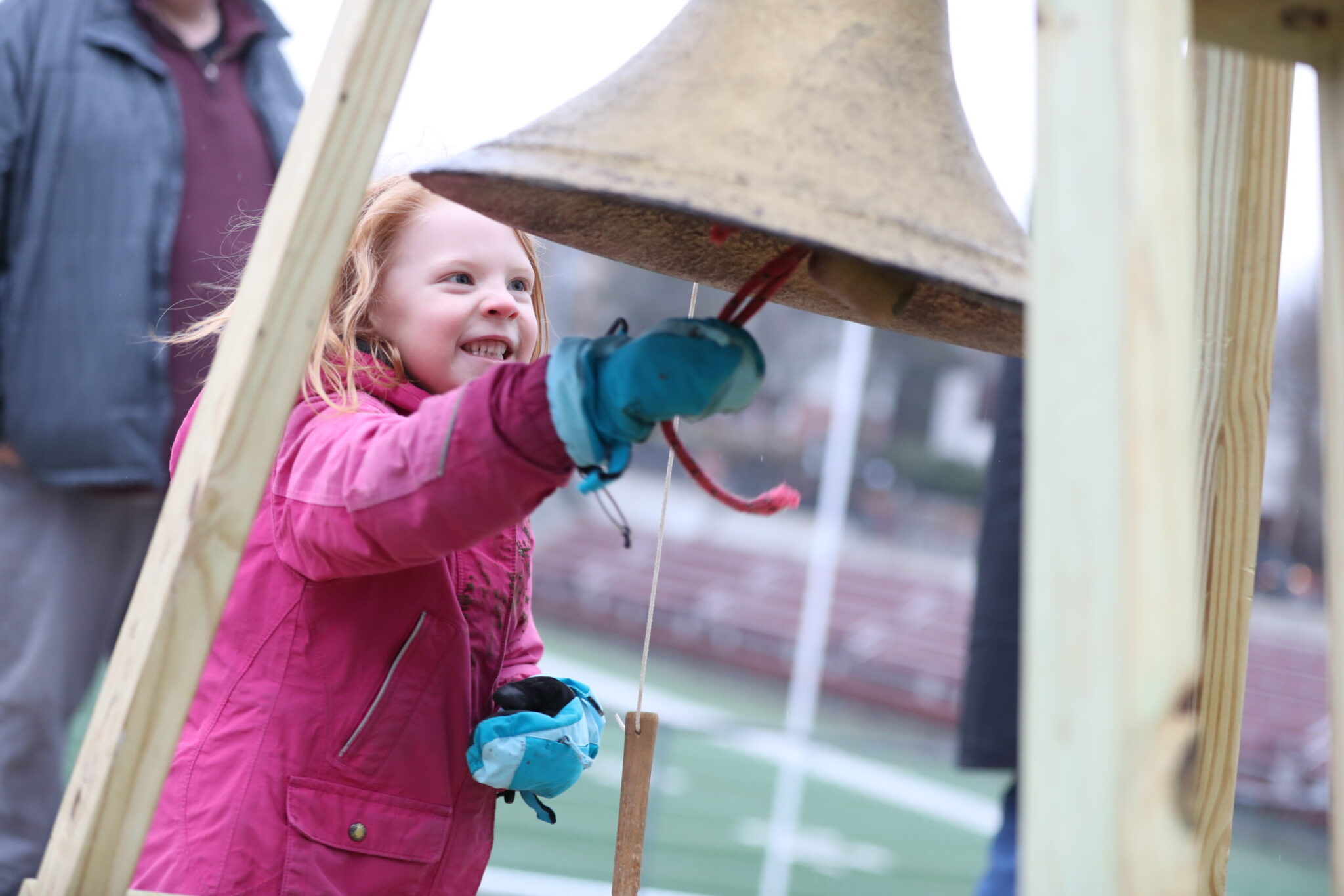 girl ringing First Bell